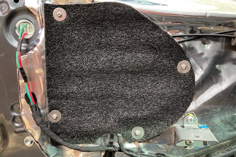 ResoNix Barrier Installed Into Car Door With Well Nuts and Machine Screws