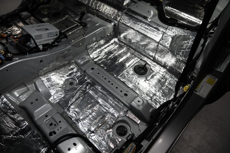 ResoNix Sound Solutions CLD Squares Sound Deadener installed into the front drivers side floor of a Ford Bronco