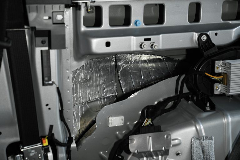ResoNix Sound Solutions CLD Squares Sound Deadener installed into the passenger side quarter panel of a Ford Bronco