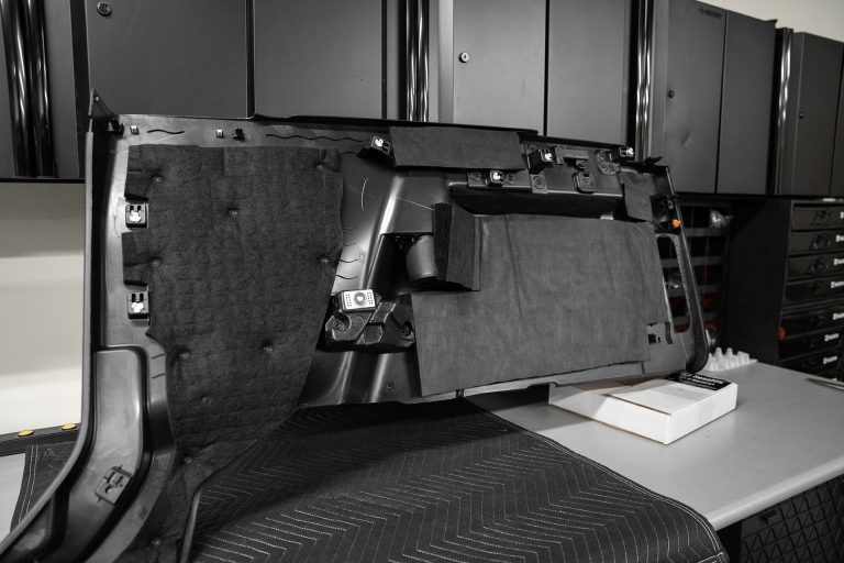 Rear of Ford Bronco quarter panel interior trim treated with ResoNix Fiber Mat