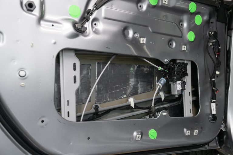Ford Bronco Inner and outer door skin door panel removed. ResoNix CLD Squares installed onto outer door skin close up
